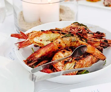 Barbecued split prawns with chervil butter