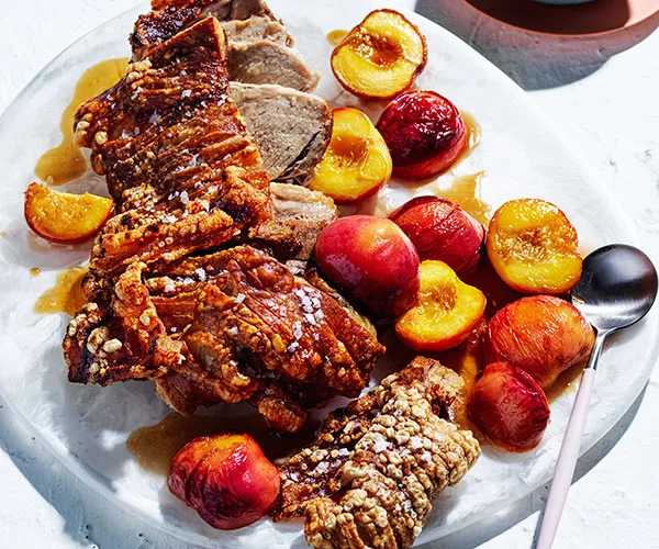 Roasted pork with the best crackling and roasted nectarines