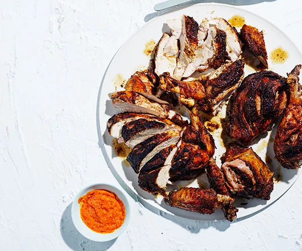 Brined barbecued turkey with spices and a piri piri sauce