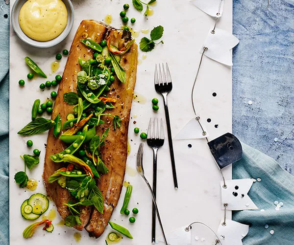 Hot-smoked mullet with zucchini flowers, peas and mint