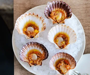 Saint Peter’s scallops with citrus dressing