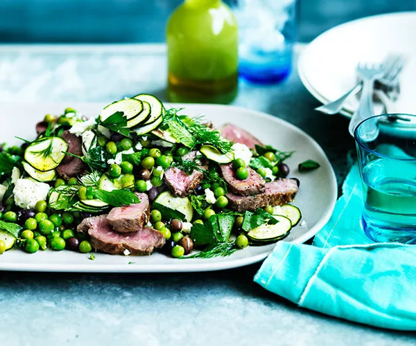 Lamb salad with peas, zucchini and olives