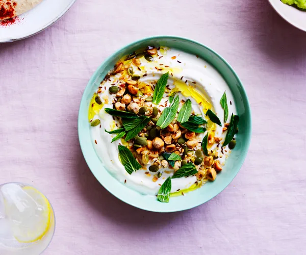 Yoghurt dip with sesame seeds, pepitas, cumin, caraway and mint