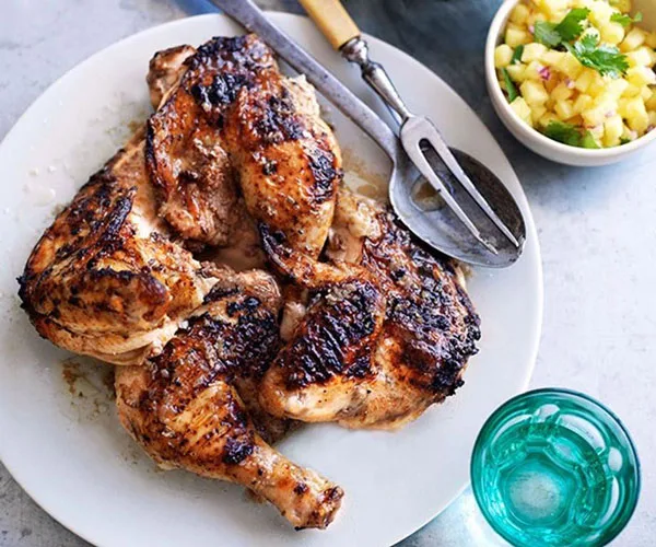 Jerk chicken with coconut rice and pineapple relish