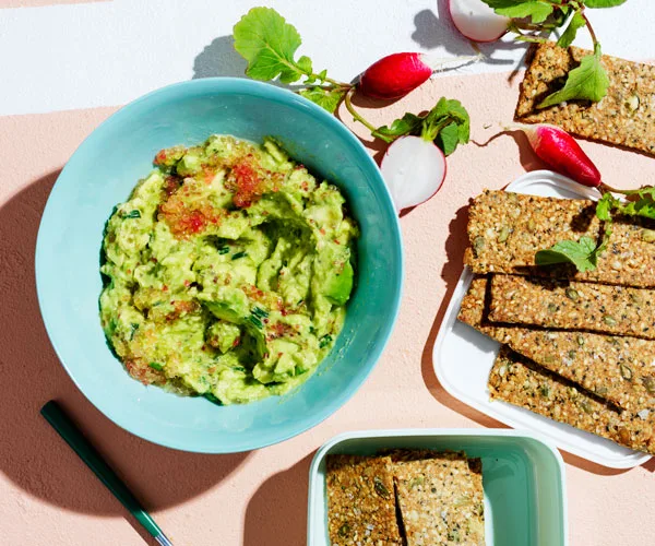 Buckwheat-hemp crackers with avocado and finger lime