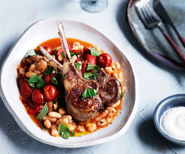 Lamb cutlets with white beans, capsicum and oregano