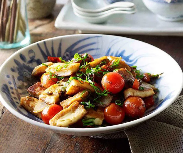 Naxi-style fried goat’s cheese, spring onions and tomatoes (Chao rubing)