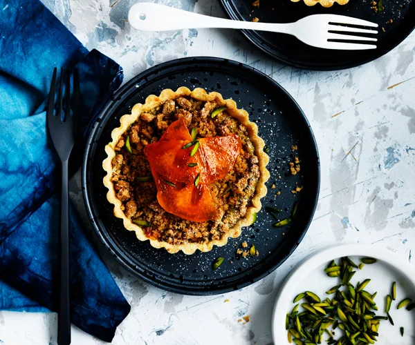 Persimmon, pistachio and ginger crumble tarts