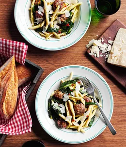 Pork and fennel meatball strozzapreti with braised chicory and chilli