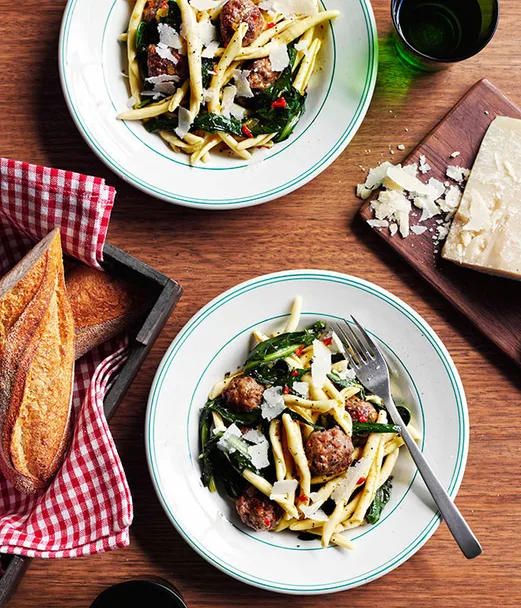 Pork and fennel meatball strozzapreti with braised chicory and chilli