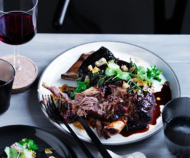 Slow roasted lamb shoulder with yellow bean, cumin and chilli