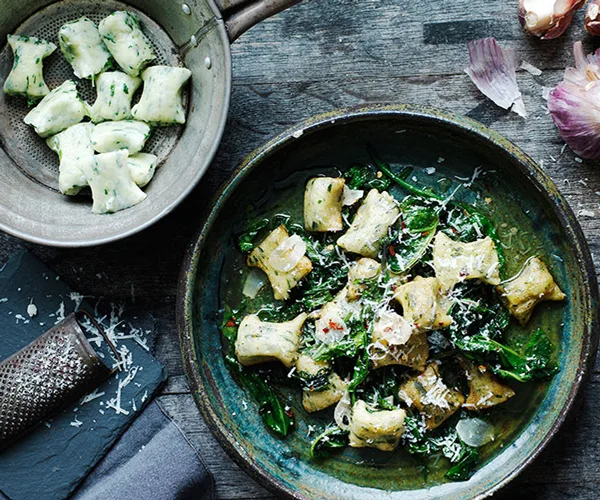 Gnudi with wilted bitter greens