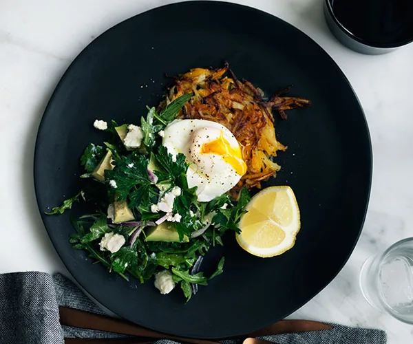 Pumpkin rösti with poached egg, and mint, feta and avocado salad