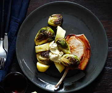 Pork chops, Brussels sprouts and potatoes with mustard and cider butter