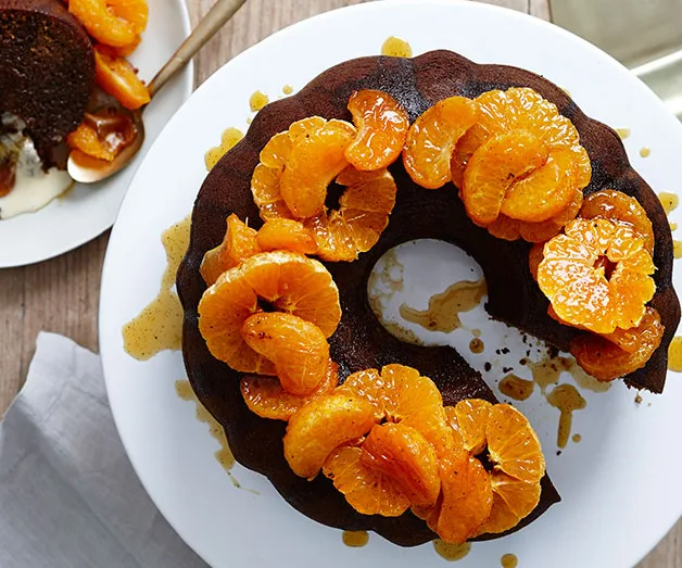 Dark gingerbread cake with mandarin compote