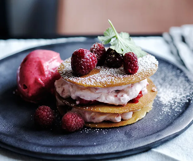 Stephanie Alexander&rsquo;s raspberry and rose-geranium sorbet with honey wafers, raspberries and cream