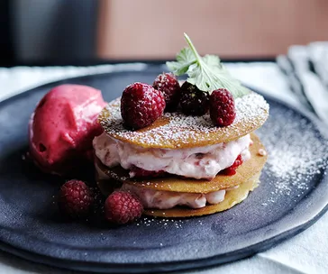 Stephanie Alexander’s raspberry and rose-geranium sorbet with honey wafers, raspberries and cream