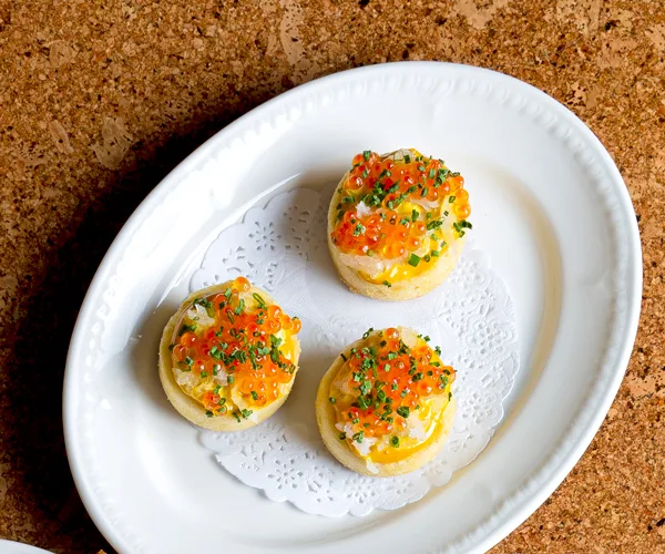 Shane Delia’s semolina crumpets with caviar and saffron egg mayonnaise