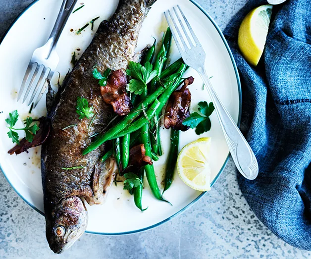 Rainbow trout with almonds, bacon and green beans