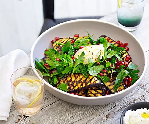 Barbecued eggplant salad with goat’s curd, mint and pomegranate