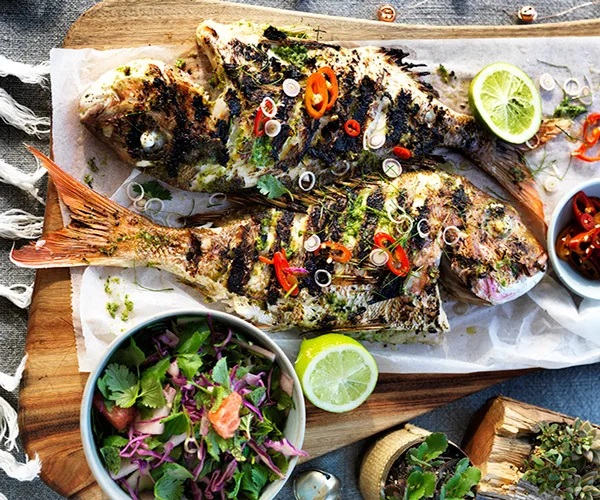 Barbecued whole fish with lemongrass and lime leaves