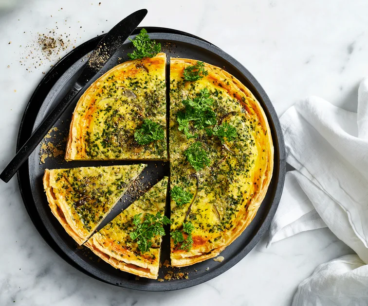Cheddar and onion quiche recipe | Gourmet Traveller