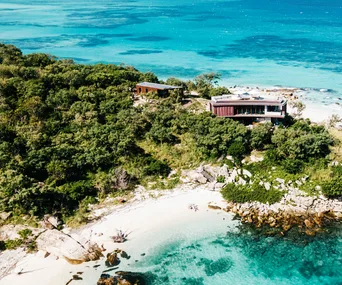 Aerial view of Lizard Island accommodation and its pristine beaches by the Great Barrier Reef