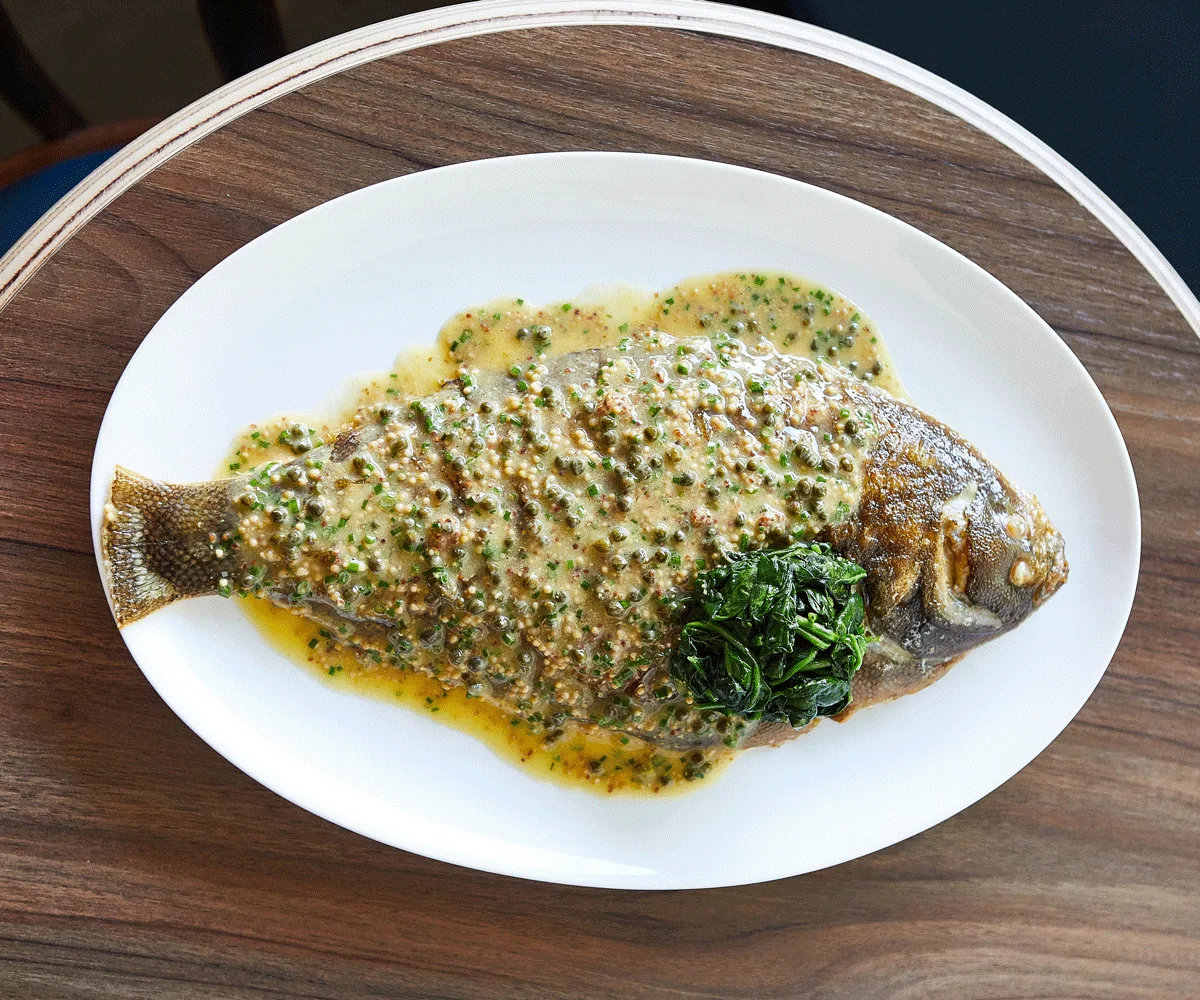 Cafe Paci in Newtown, Sydney, whole fish with yellow seeded sauce