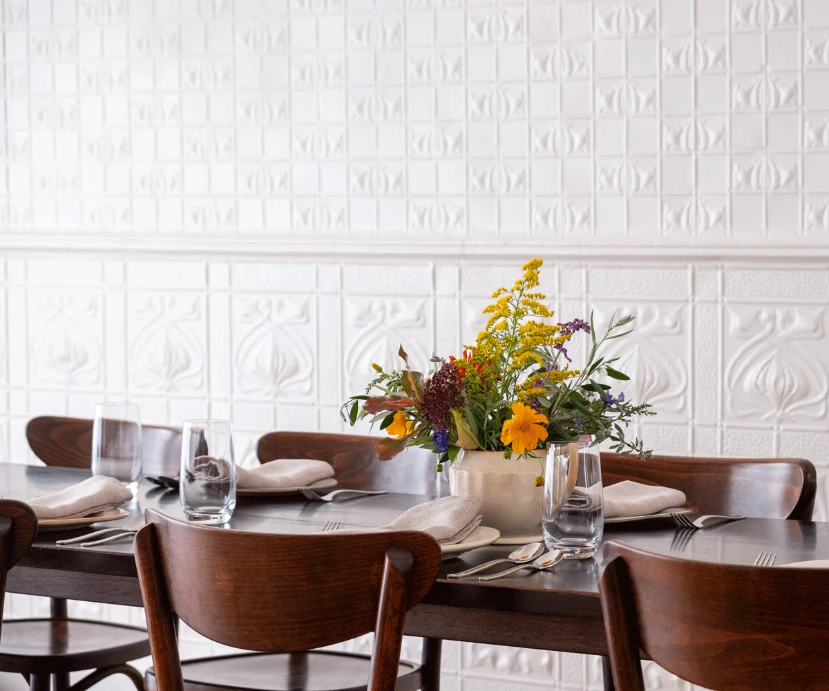 Blume restaurant in Boonah regional Queensland dining room with flowers on a timber table