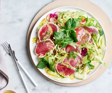 seared tuna salad with spring vegetables and leafy greens