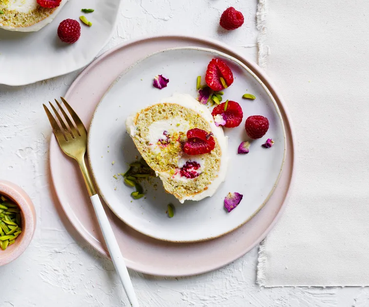 Pistachio and rose roulade with lychees and raspberries recipe | Gourmet Traveller