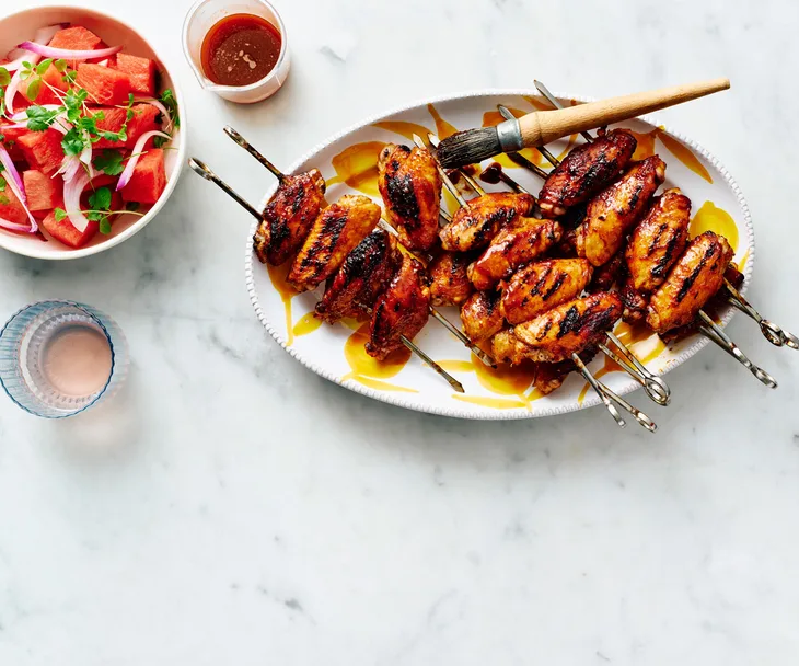 Charred chicken wings in hot ancho and honey