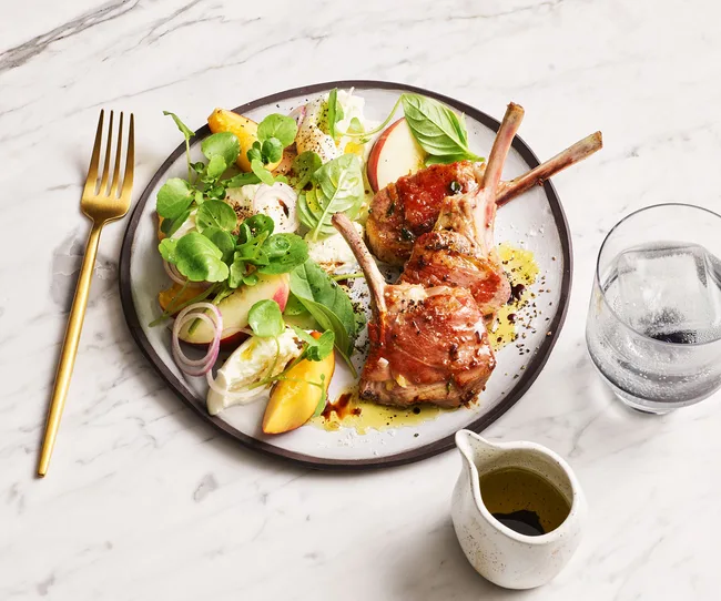 Prosciutto-wrapped lamb chops with salad