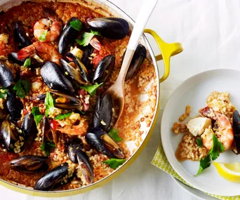 Spanish paella rice dish with mussels and prawns