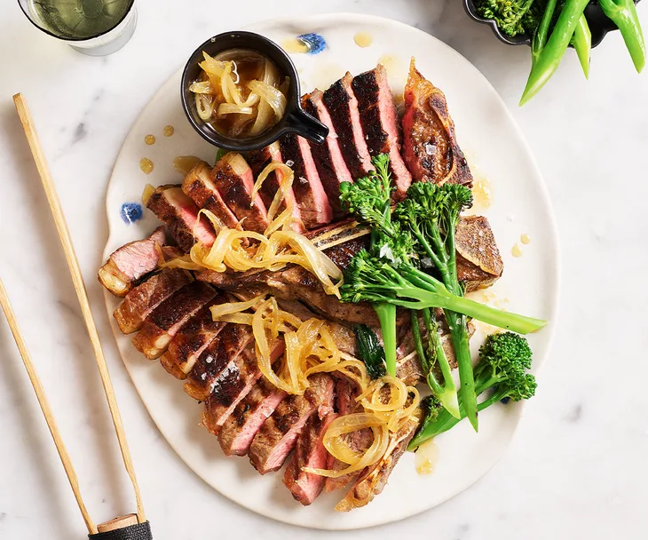 Steak with caramelised onion and ginger ponzu