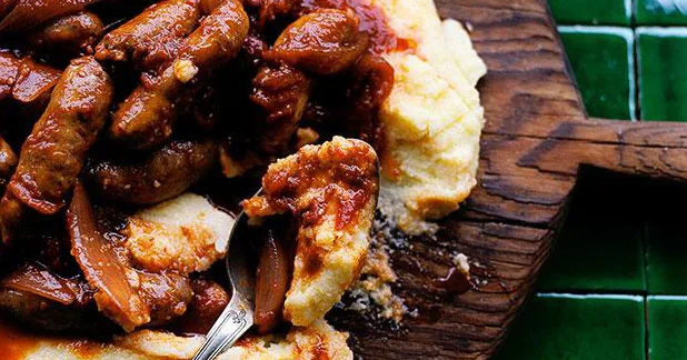 Tomato-Braised Sausages on Parmesan Polenta