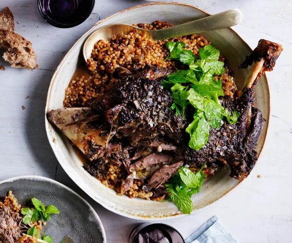 Eight-hour lamb shoulder with Israeli couscous and labne
