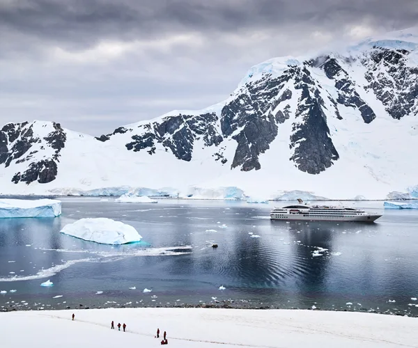 Hikers' view of Ponant's *Le Soléal* anchored off Danco Island.