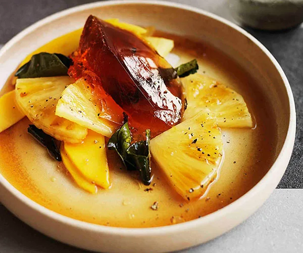 Pineapple and mango salad with kaffir lime caramel