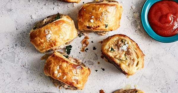 Cacio e pepe sausage rolls recipe | Gourmet Traveller