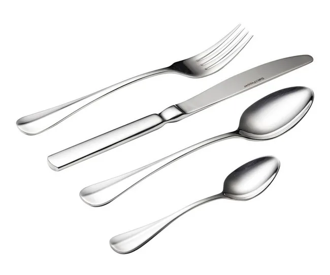 Four pieces of shiny stainless steel cutlery: a fork, knife, tablespoon, and teaspoon, arranged aesthetically.