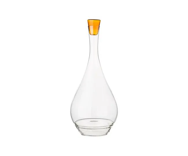 Glass decanter with a tall, narrow neck and an orange stopper on a white background.
