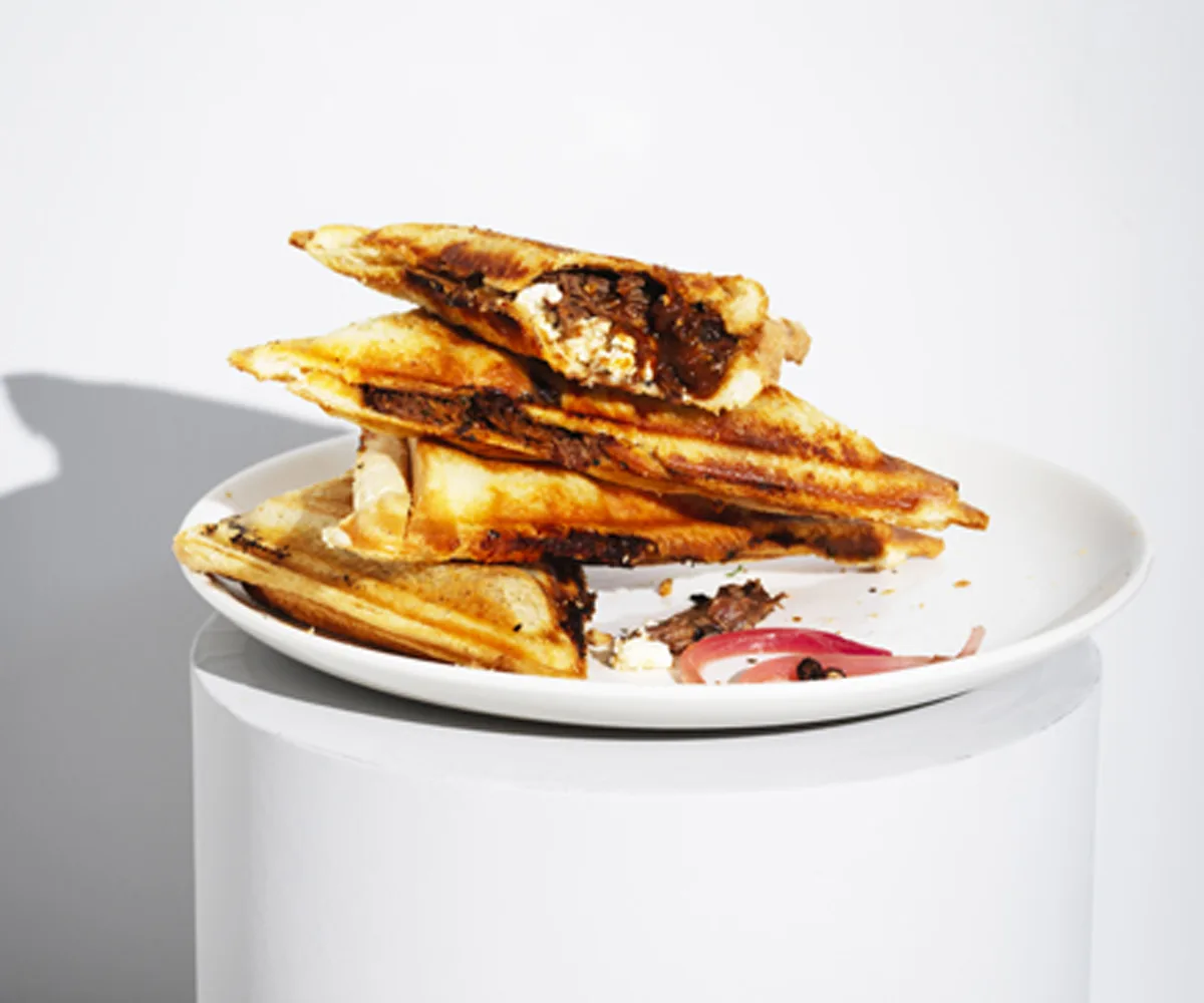 Braised beef and feta jaffles with pickled onion