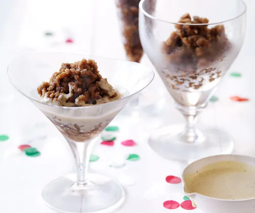 Three glasses of coffee granita with whipped cream on a white surface, surrounded by scattered confetti.