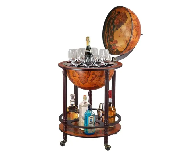 Vintage globe bar cart with glasses and assorted liquor bottles on a wooden base with wheels.