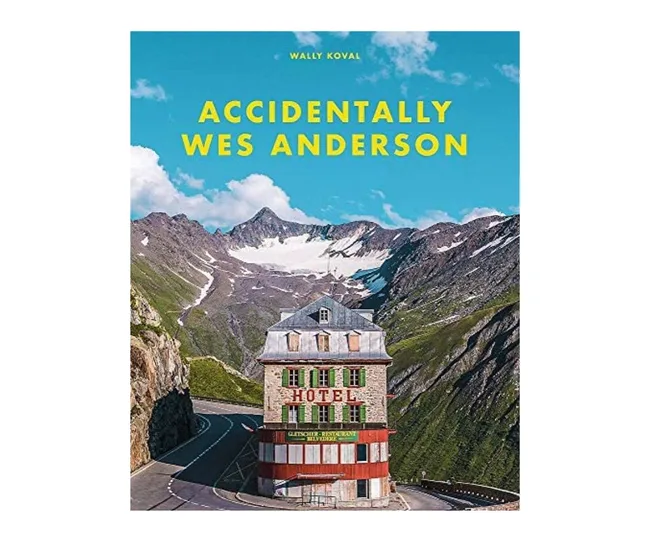 Cover of "Accidentally Wes Anderson" showing a building in a mountain setting with a bright blue sky.