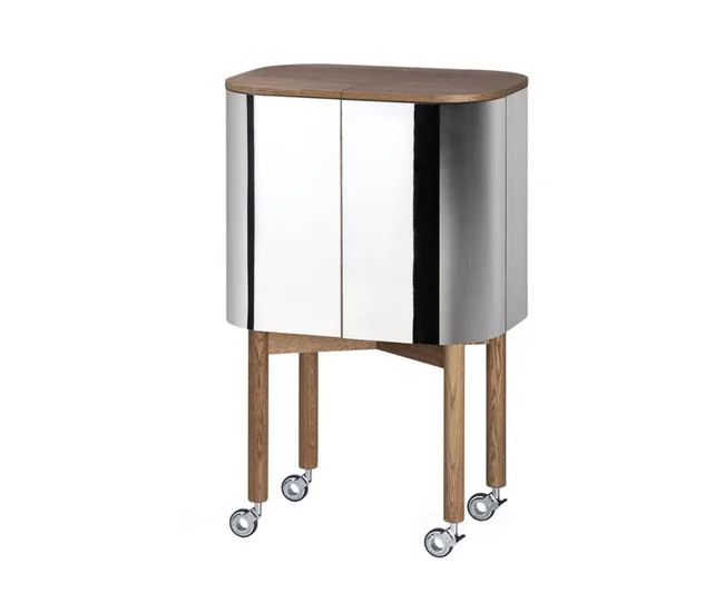 Modern bar cabinet with a rounded wood top, metallic finish, and four wooden legs on wheels.