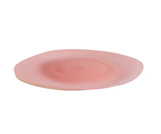 Pink oval melamine dinner plate with glossy finish and slight unevenness in shape.