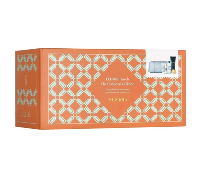 Orange box with geometric design labeled "ELEMIS Travels The Collector's Edition" containing luxury face and body products.
