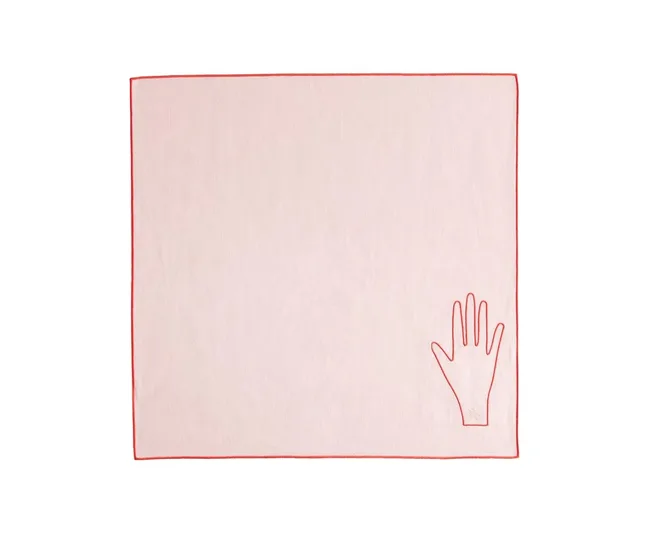 A plain white cloth with a red hand outline in the bottom right corner and a red border.